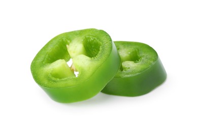 Photo of Slices of green jalapeno pepper isolated on white