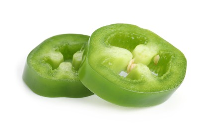 Photo of Slices of green jalapeno pepper isolated on white