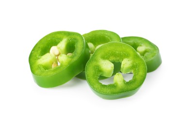 Photo of Slices of green jalapeno pepper isolated on white