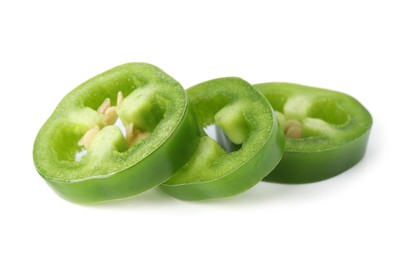 Photo of Slices of green jalapeno pepper isolated on white