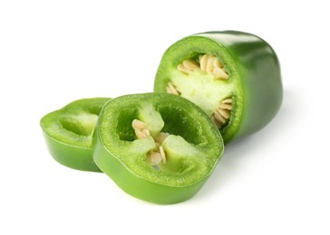 Photo of Slices of green jalapeno pepper isolated on white