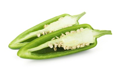 Photo of Halves of green jalapeno pepper isolated on white
