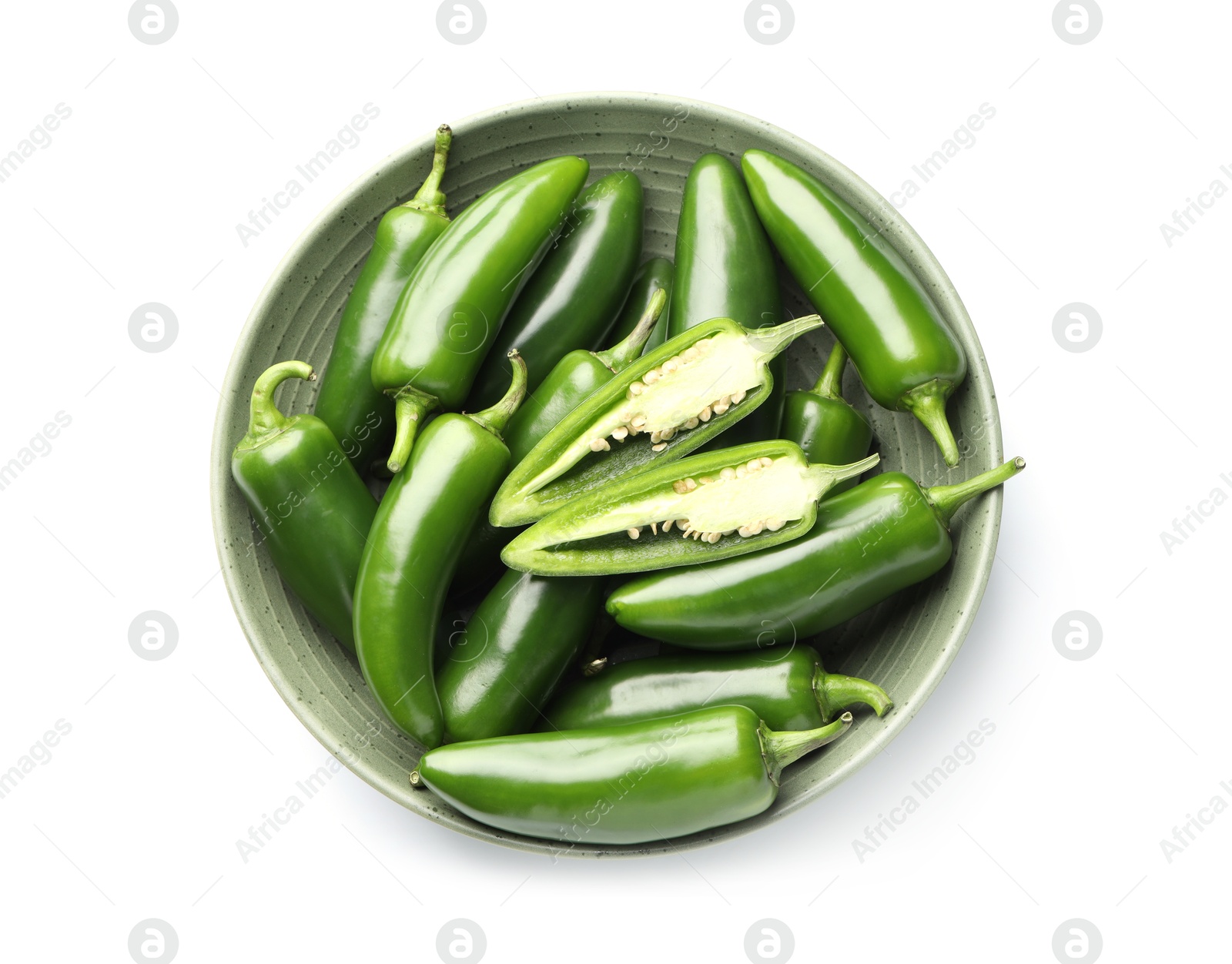 Photo of Fresh green jalapeno peppers in bowl isolated on white, top view