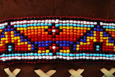 Photo of Traditional warbonnet (Native American chief headdress) as background, closeup