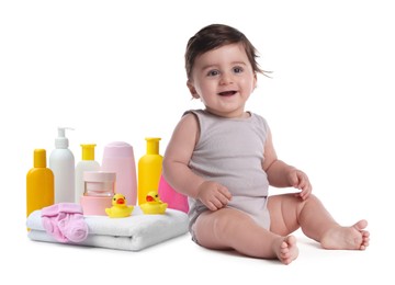 Image of Cute little baby, bathing accessories and toiletries isolated on white