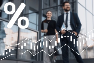 Image of Business people outdoors. Percent sign and graphs