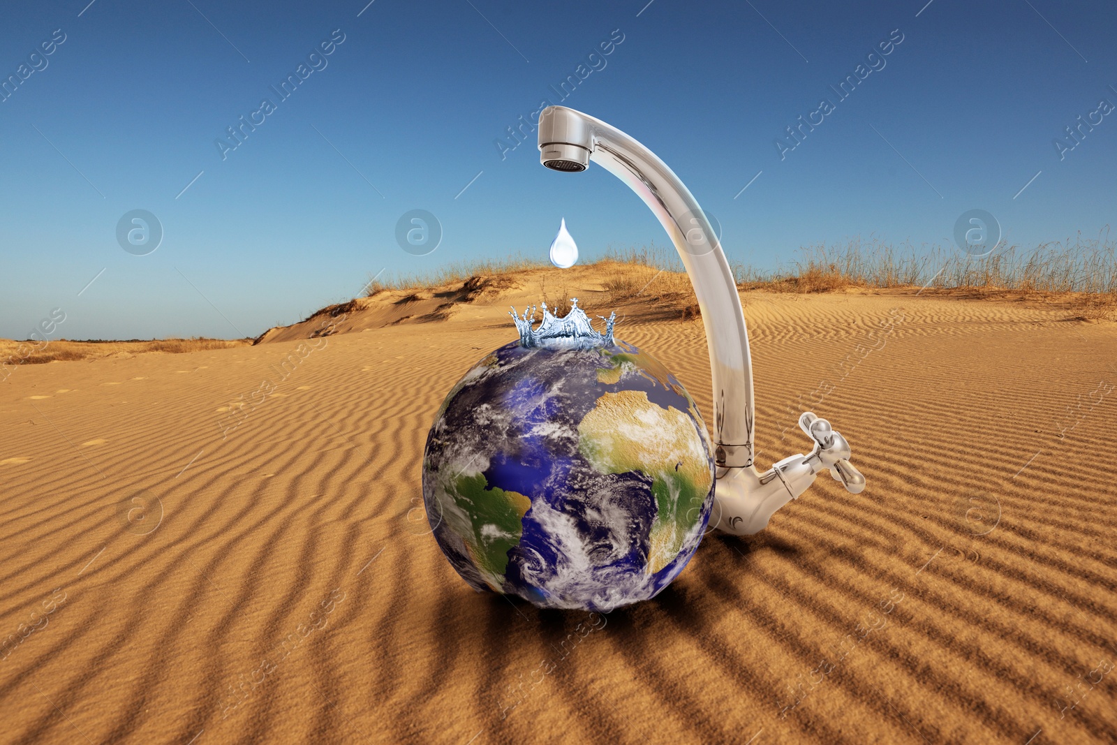 Image of Save water concept. Earth under tap with dripping water in desert