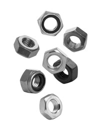 Image of Different metal nuts falling against white background