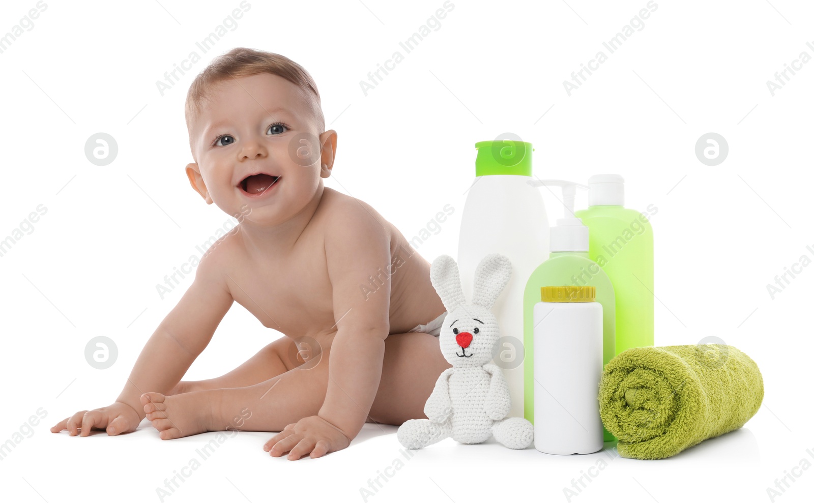 Image of Cute little baby, bathing accessories and toiletries isolated on white