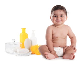 Image of Cute little baby, bathing accessories and toiletries isolated on white