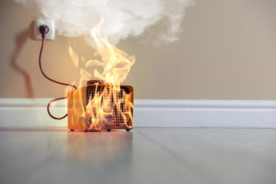 Image of Burning heater in room, flames all over device. Do not leave unattended