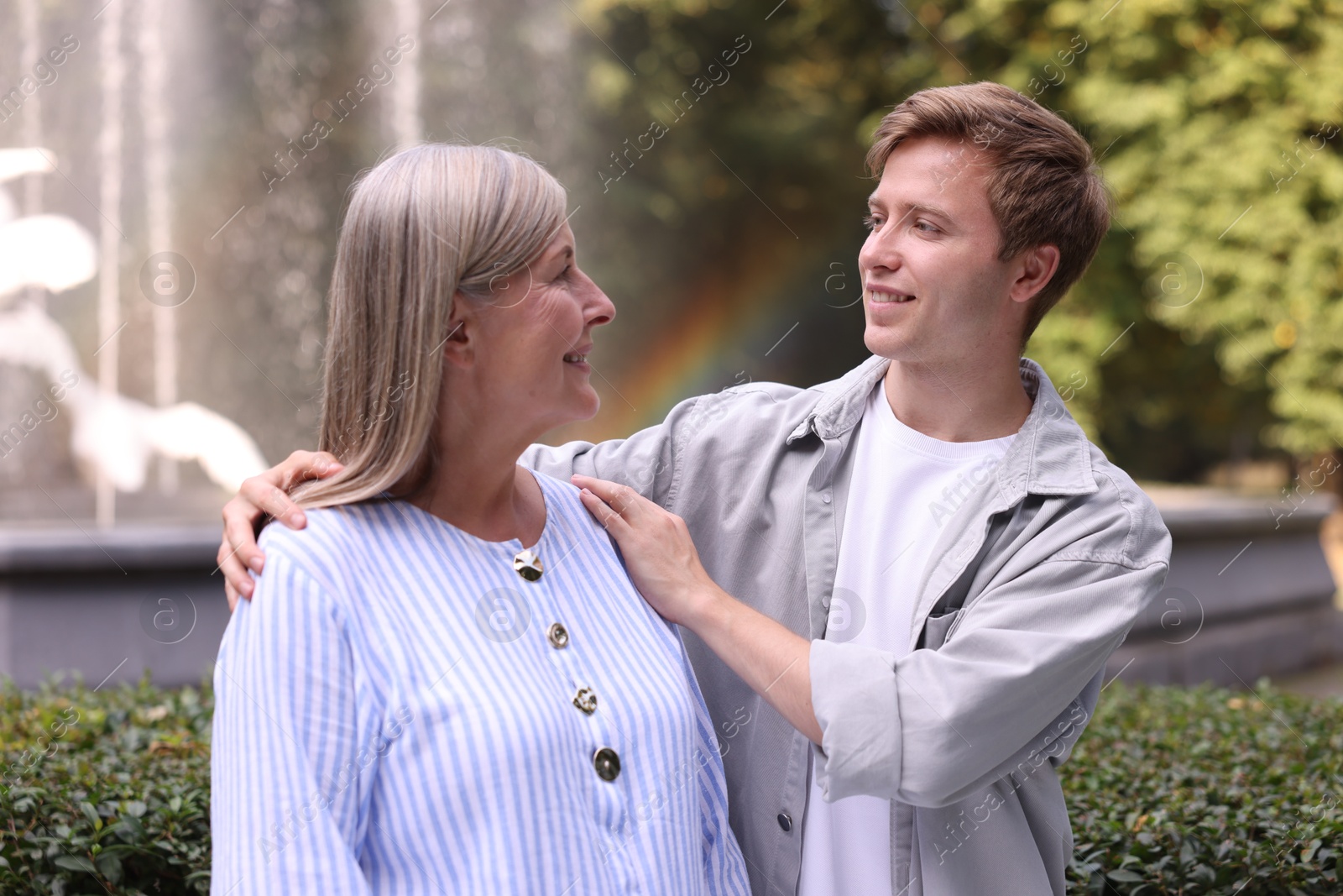 Photo of Mother and her son outdoors. Family bonding