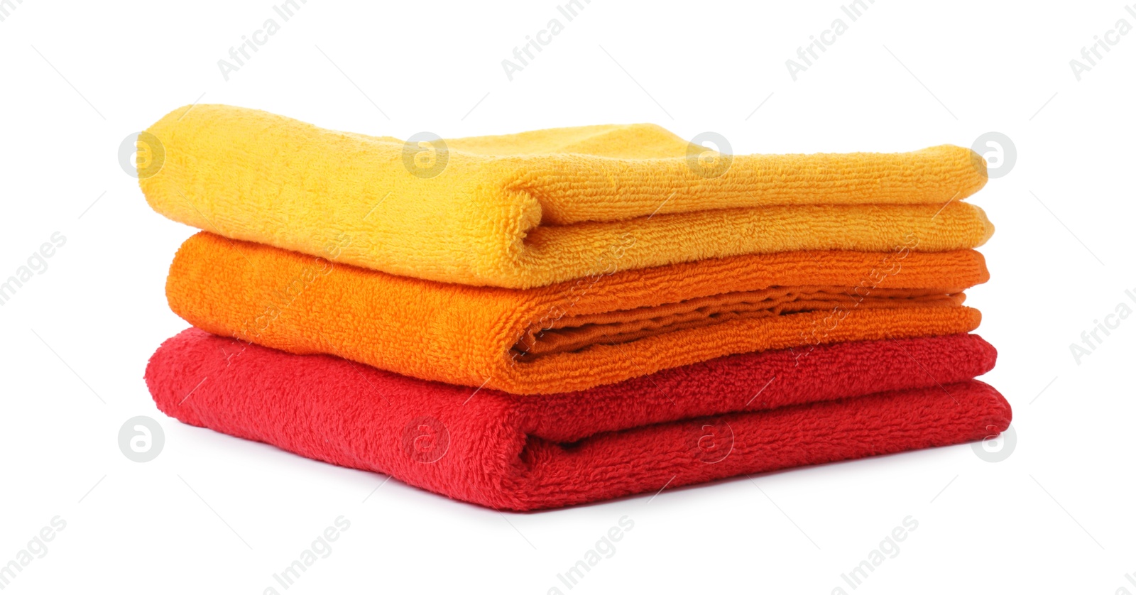 Photo of Stack of fresh terry towels isolated on white
