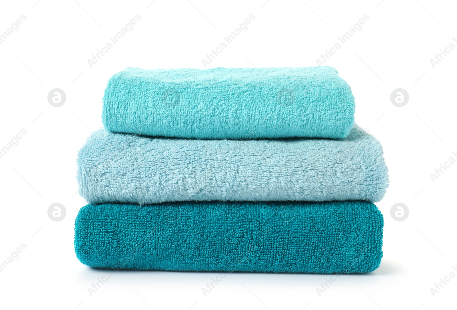 Photo of Stack of fresh terry towels isolated on white