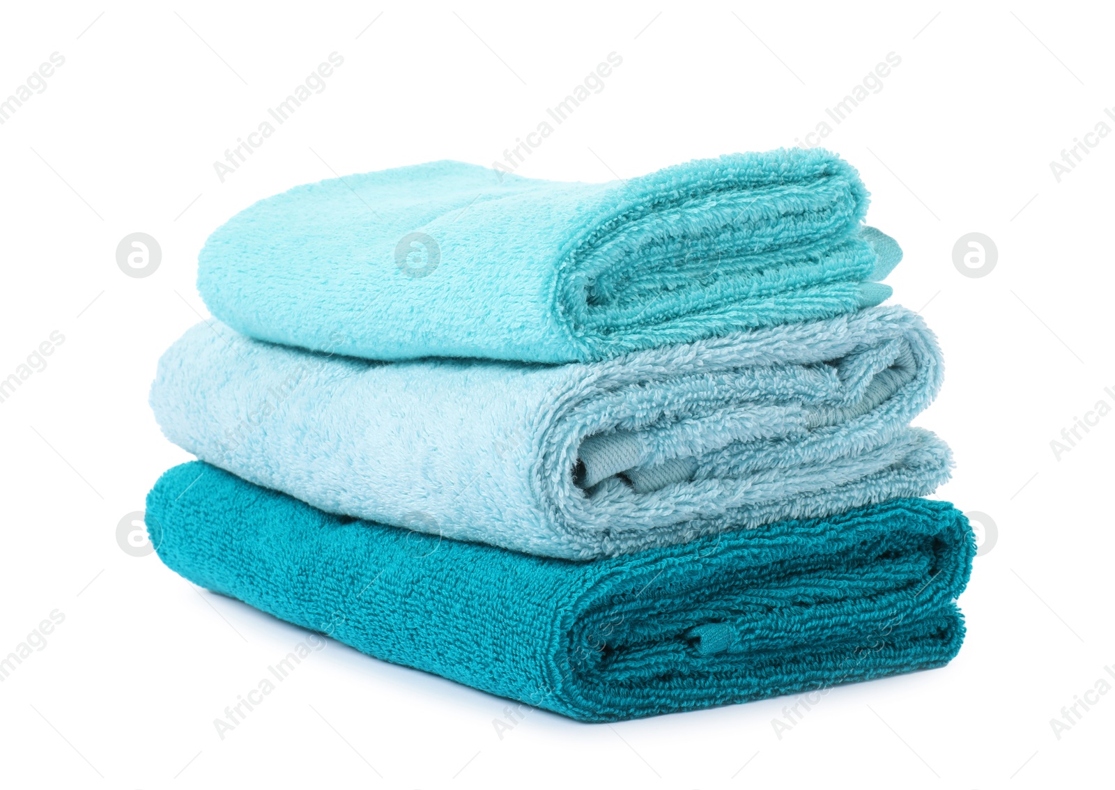 Photo of Stack of fresh terry towels isolated on white
