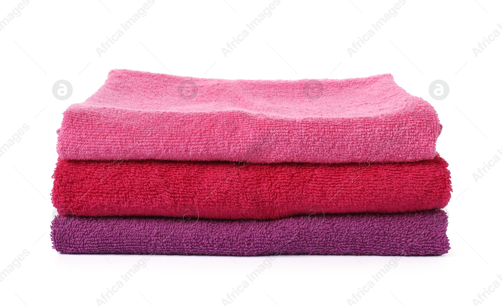 Photo of Stack of fresh terry towels isolated on white