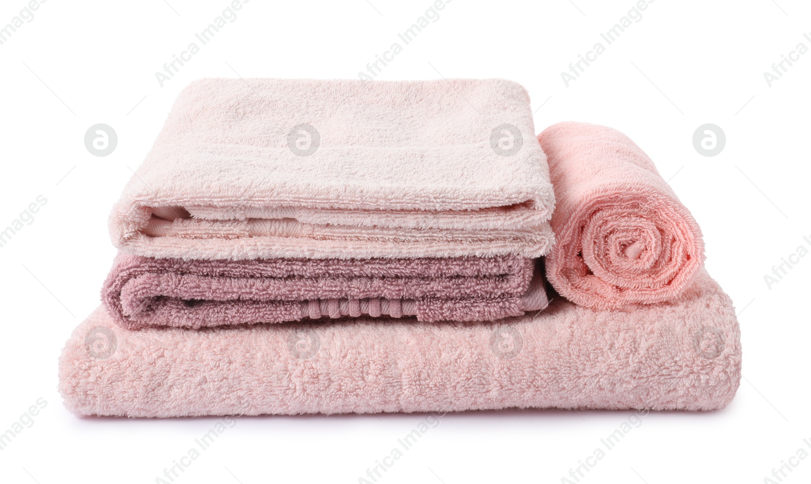 Photo of Stack of fresh terry towels isolated on white