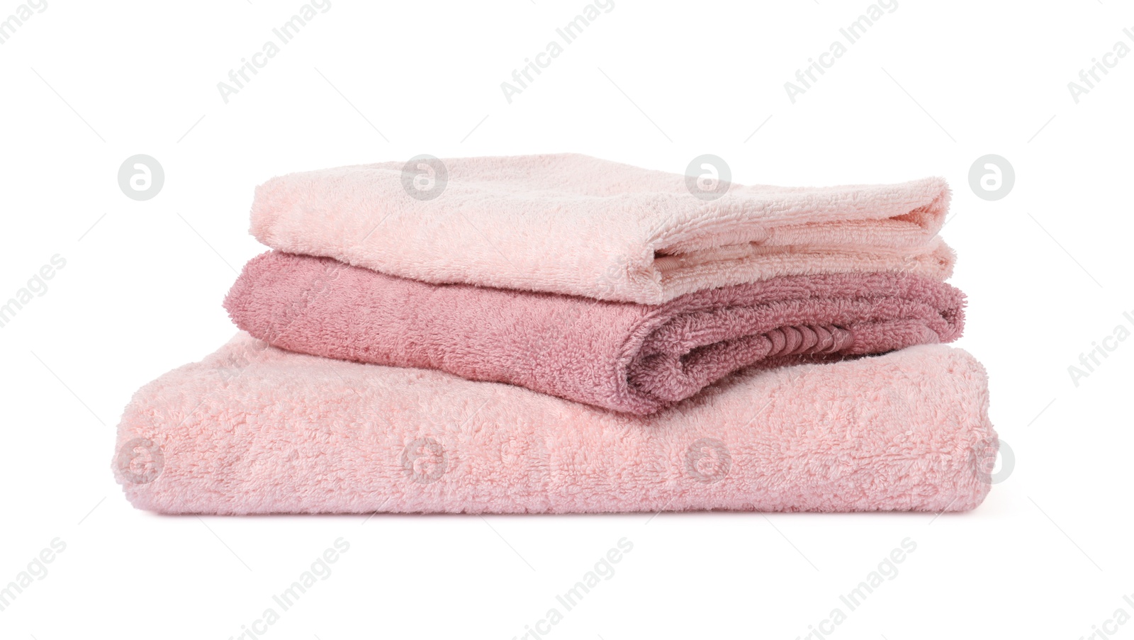 Photo of Stack of fresh terry towels isolated on white