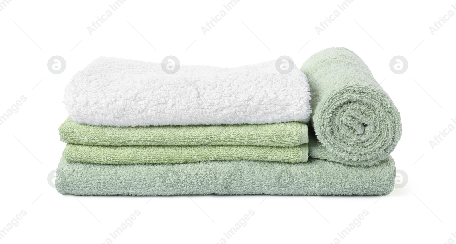 Photo of Stack of fresh terry towels isolated on white
