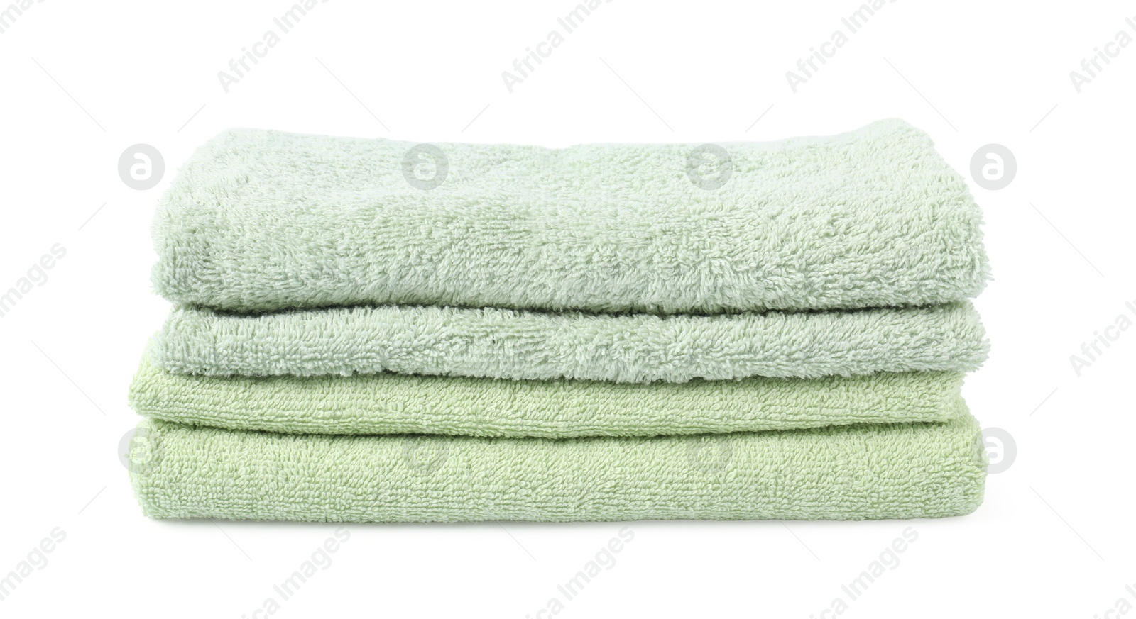 Photo of Stack of fresh terry towels isolated on white