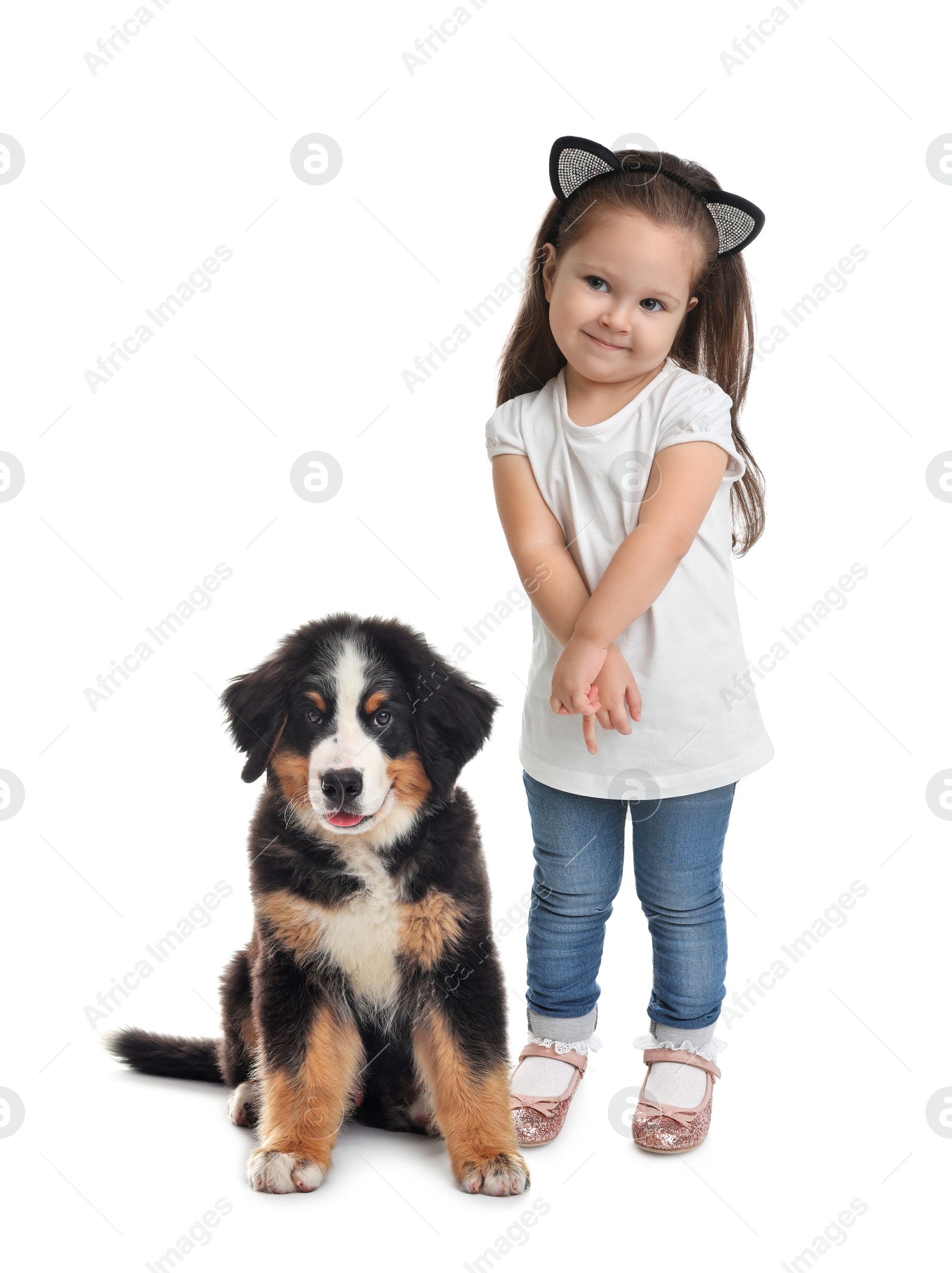 Image of Cute child and fluffy dog on white background. First pet