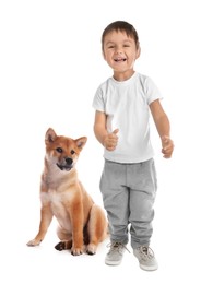 Image of Cute child and dog on white background. First pet