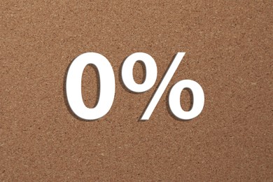 Image of Zero percent commission. 0% against cork background