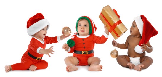 Image of Adorable babies with Santa hats, Christmas balls and gift box on white background