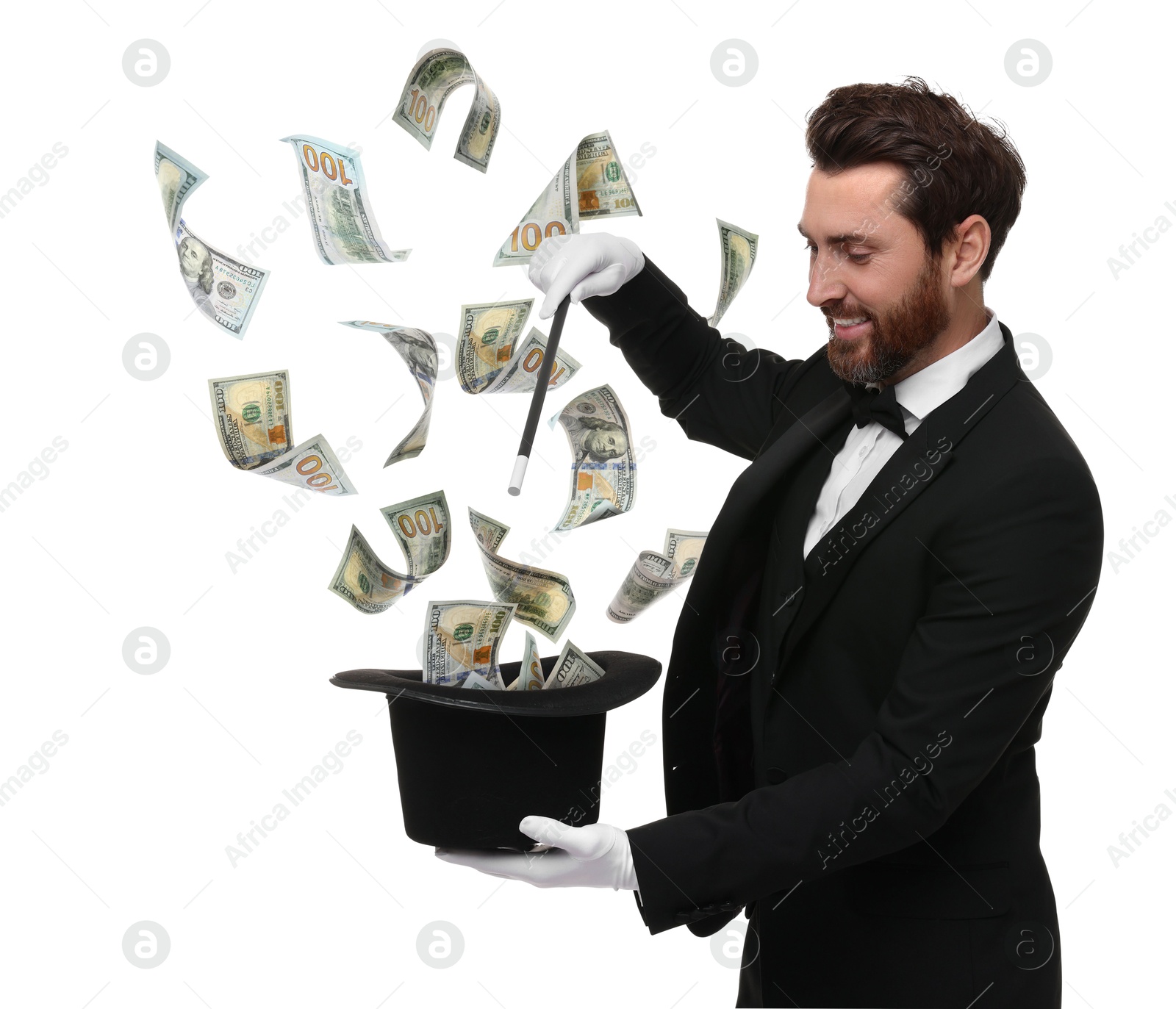 Image of Magician performing trick with money flying out of hat against white background
