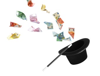 Image of Money flying out of magician's hat against white background