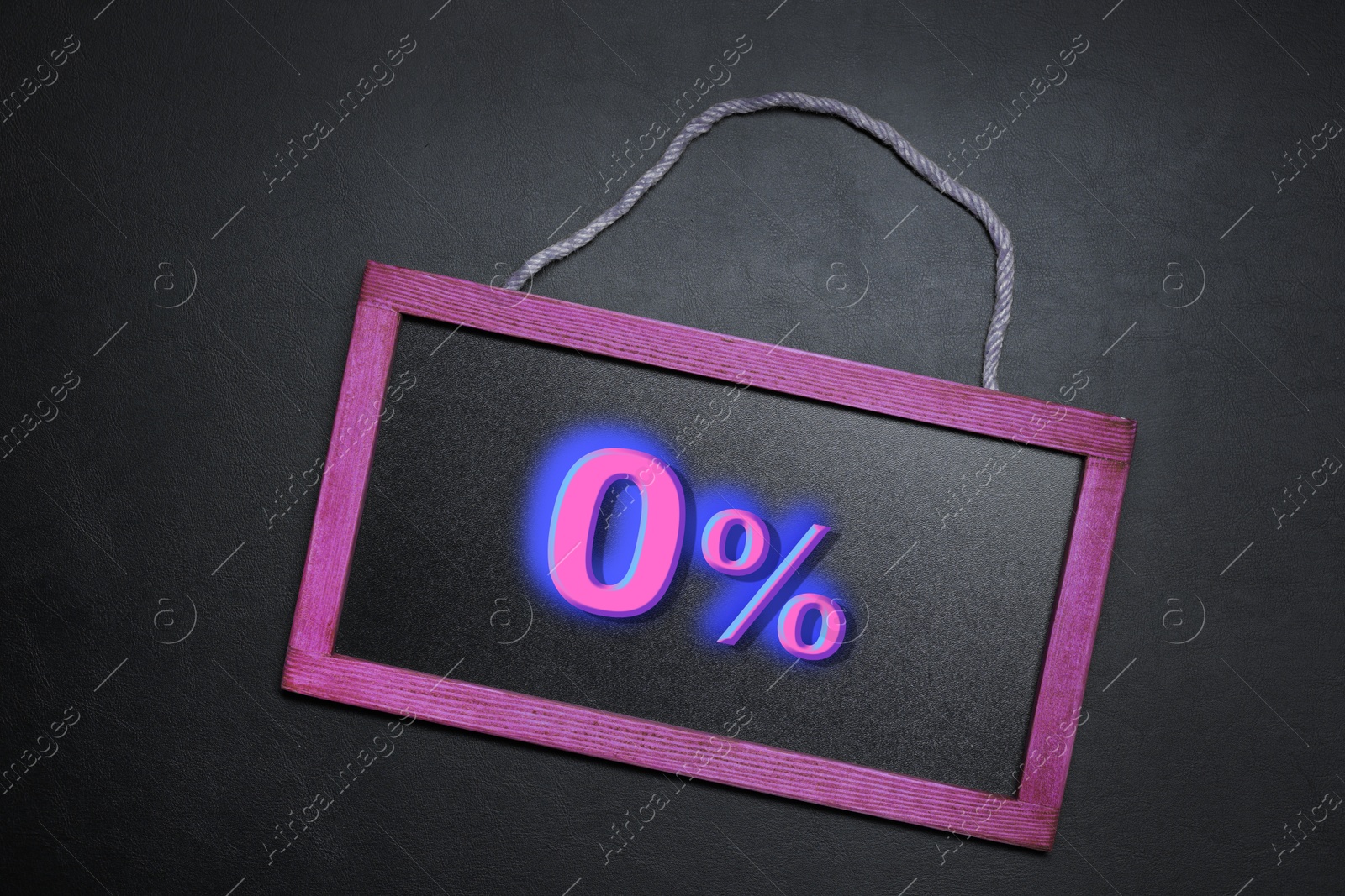 Image of Zero percent commission. Chalkboard with 0% on black background, top view