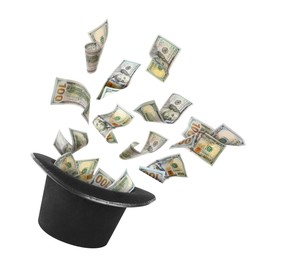 Image of Money flying out of magician's hat against white background