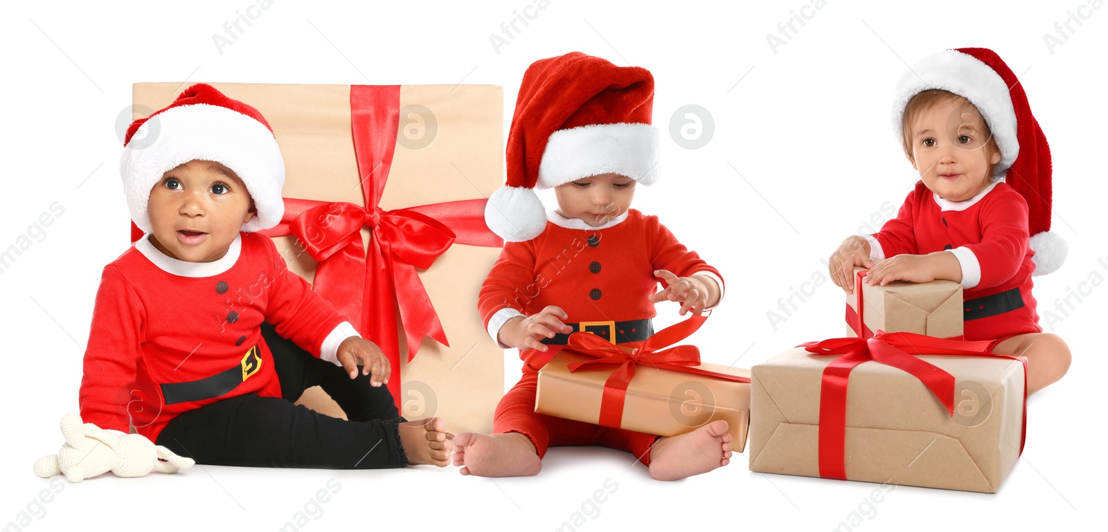 Image of Adorable babies with Santa hats and gift boxes on white background. Christmas celebration