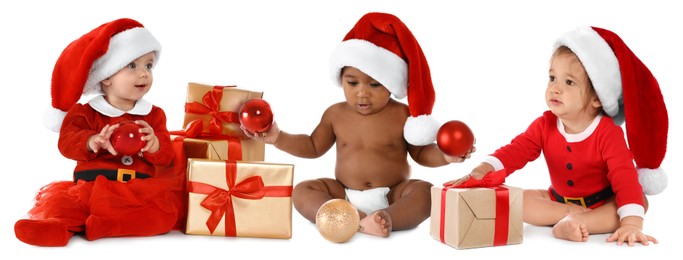 Image of Adorable babies with Santa hats, Christmas balls and gift boxes on white background