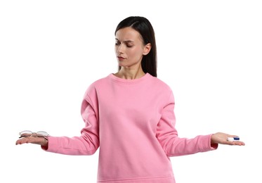 Photo of Woman choosing between glasses and contact lenses on white background