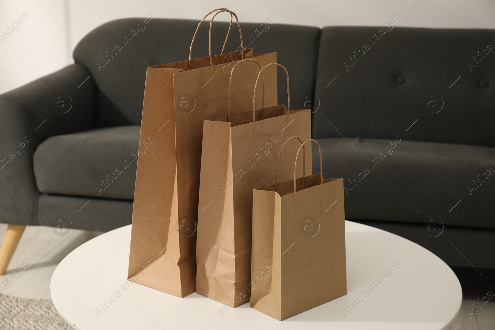 Photo of Paper bags on white table in room