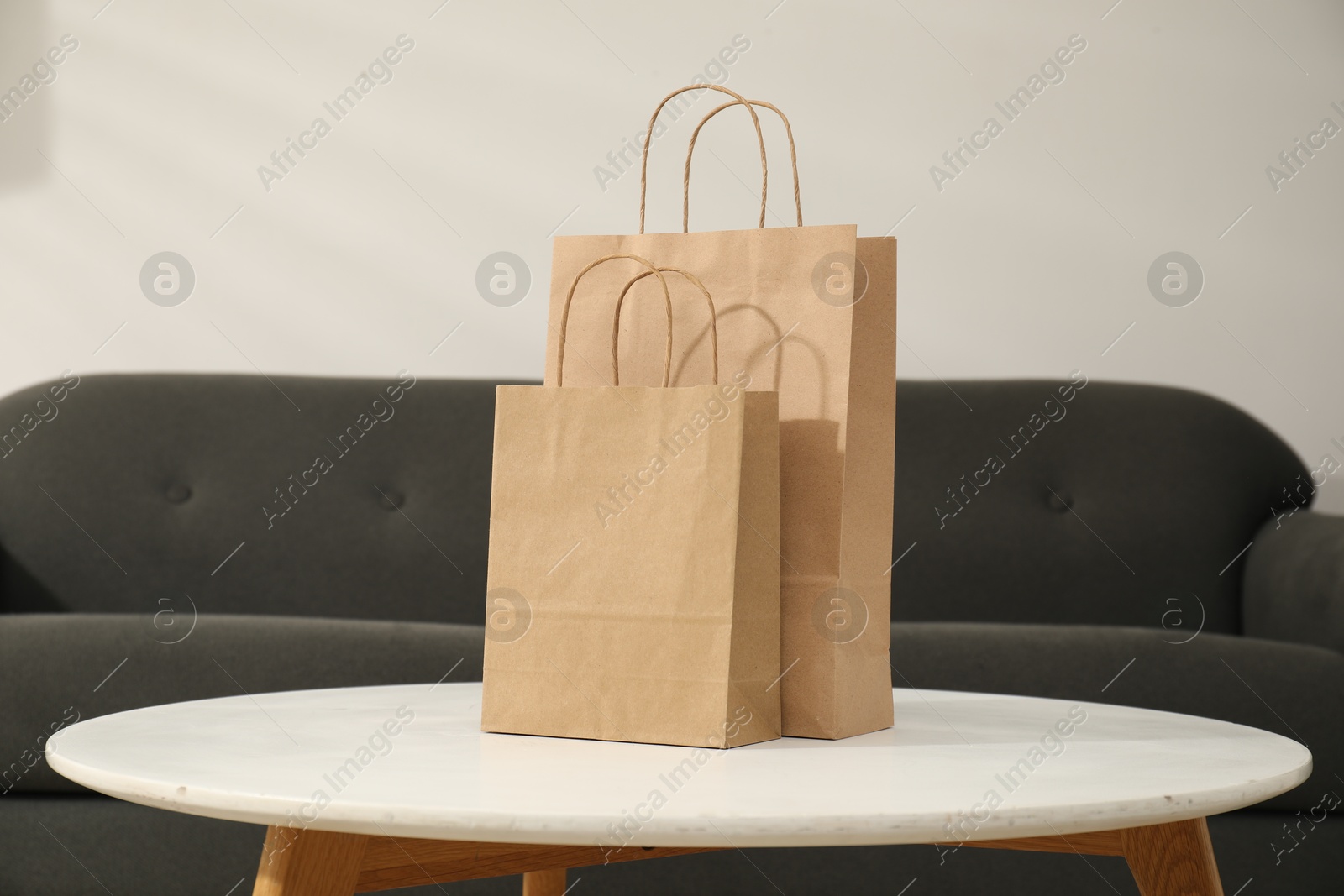 Photo of Paper bags on white table in room