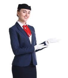 Photo of Charming stewardess showing something on white background