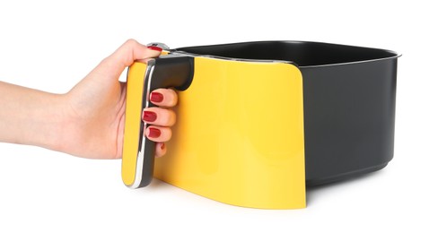 Photo of Woman with air fryer basket on white background, closeup