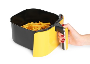 Photo of Woman with fries in air fryer basket on white background, closeup