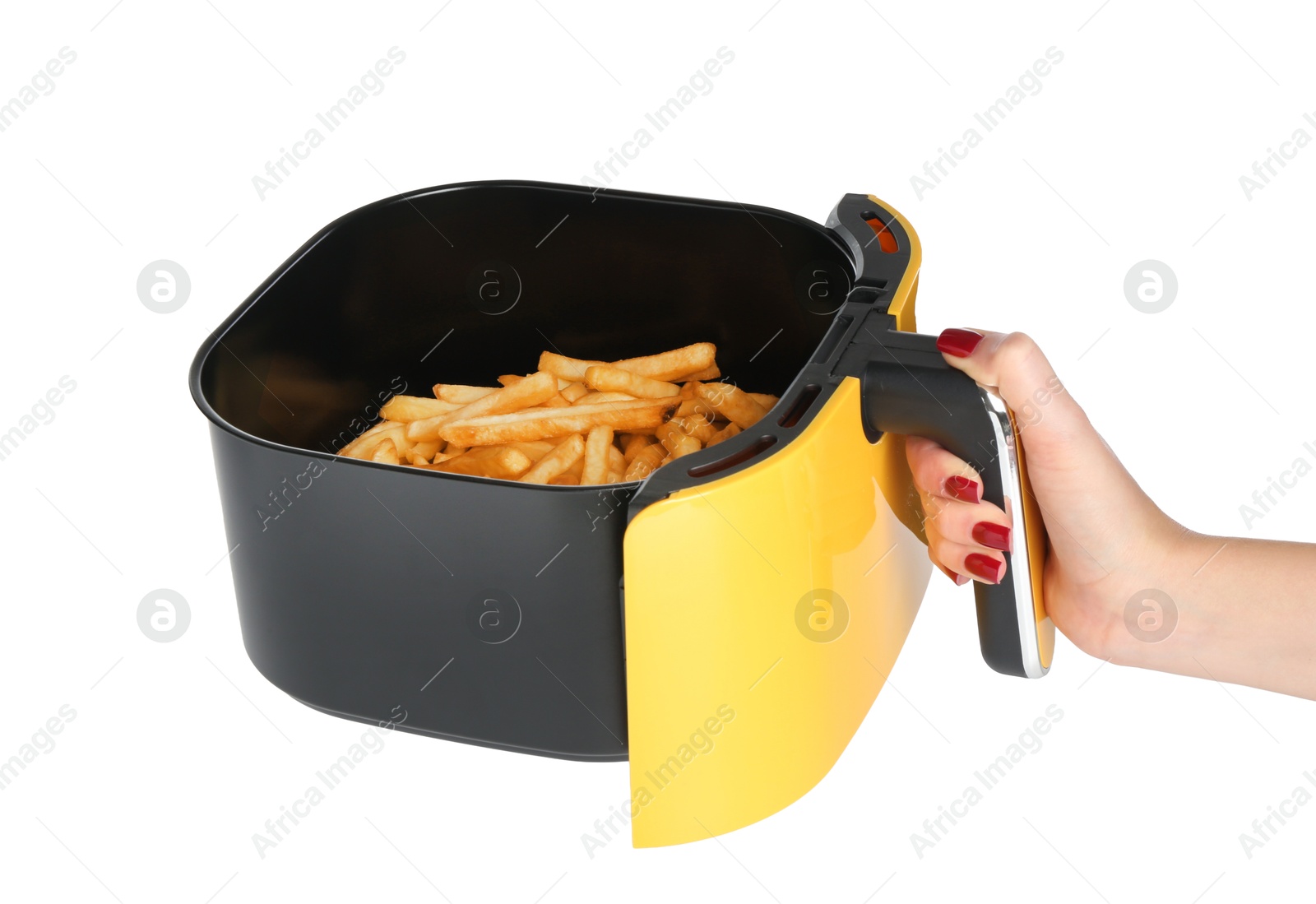 Photo of Woman with fries in air fryer basket on white background, closeup