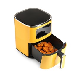 Photo of Air fryer with cooked chicken nuggets isolated on white