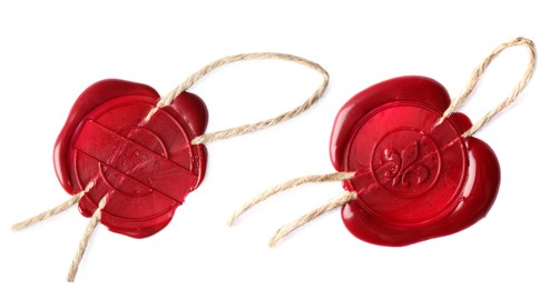 Image of Red wax seals with twine isolated on white, top view