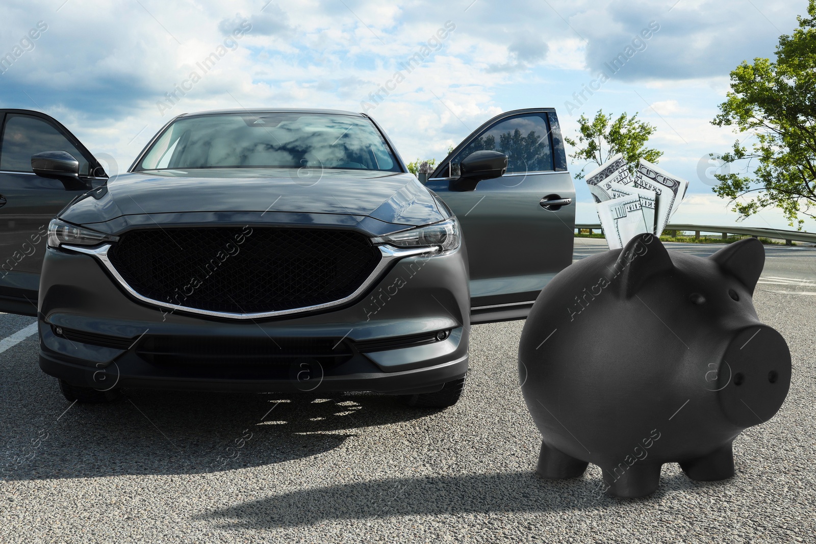 Image of Save money for car. Black piggy bank with dollars near automobile outdoors