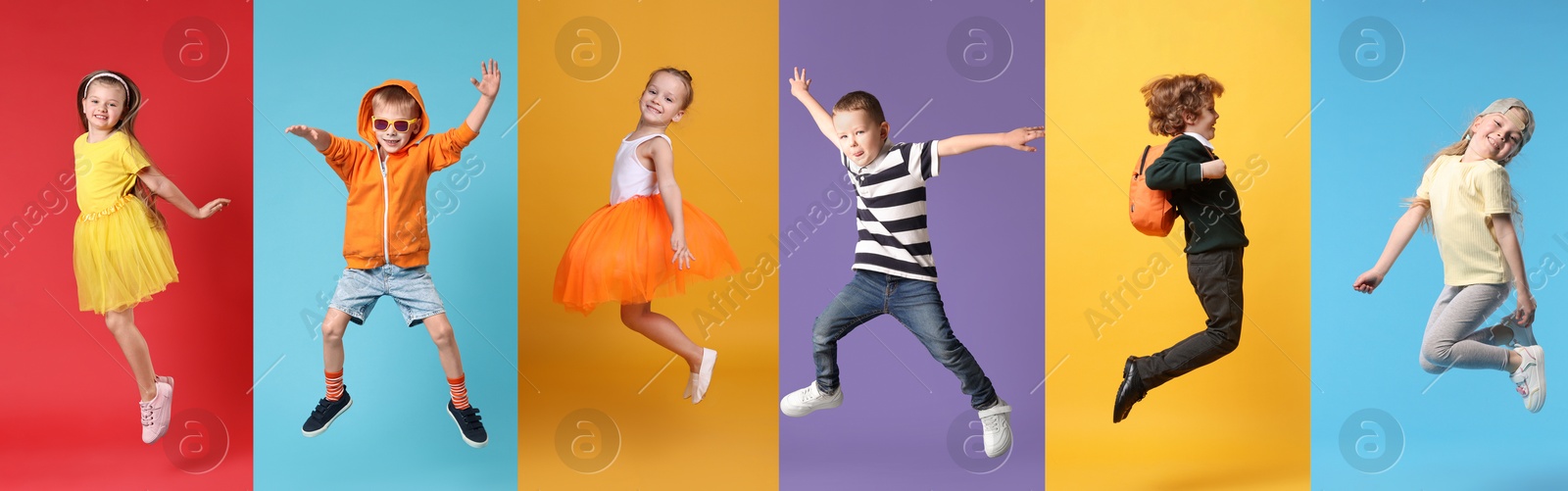 Image of Funny children jumping against colorful backgrounds. Group of girls and boys