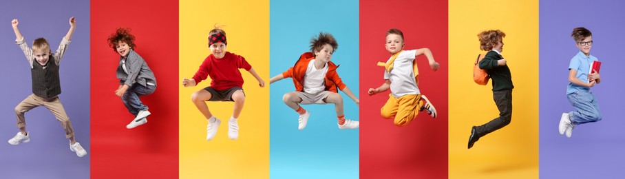 Image of Funny children jumping against colorful backgrounds. Group of boys