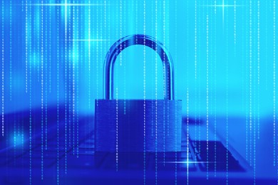 Image of Padlock on laptop and binary code, toned in blue. Cyber security