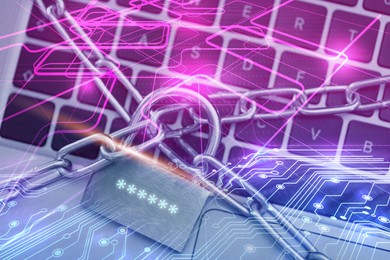 Image of Padlock with digital password asterisks and chain on laptop, color toned. Circuit board pattern. Cyber security