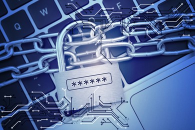 Image of Padlock with digital password asterisks and chain on laptop, toned in blue. Circuit board pattern. Cyber security