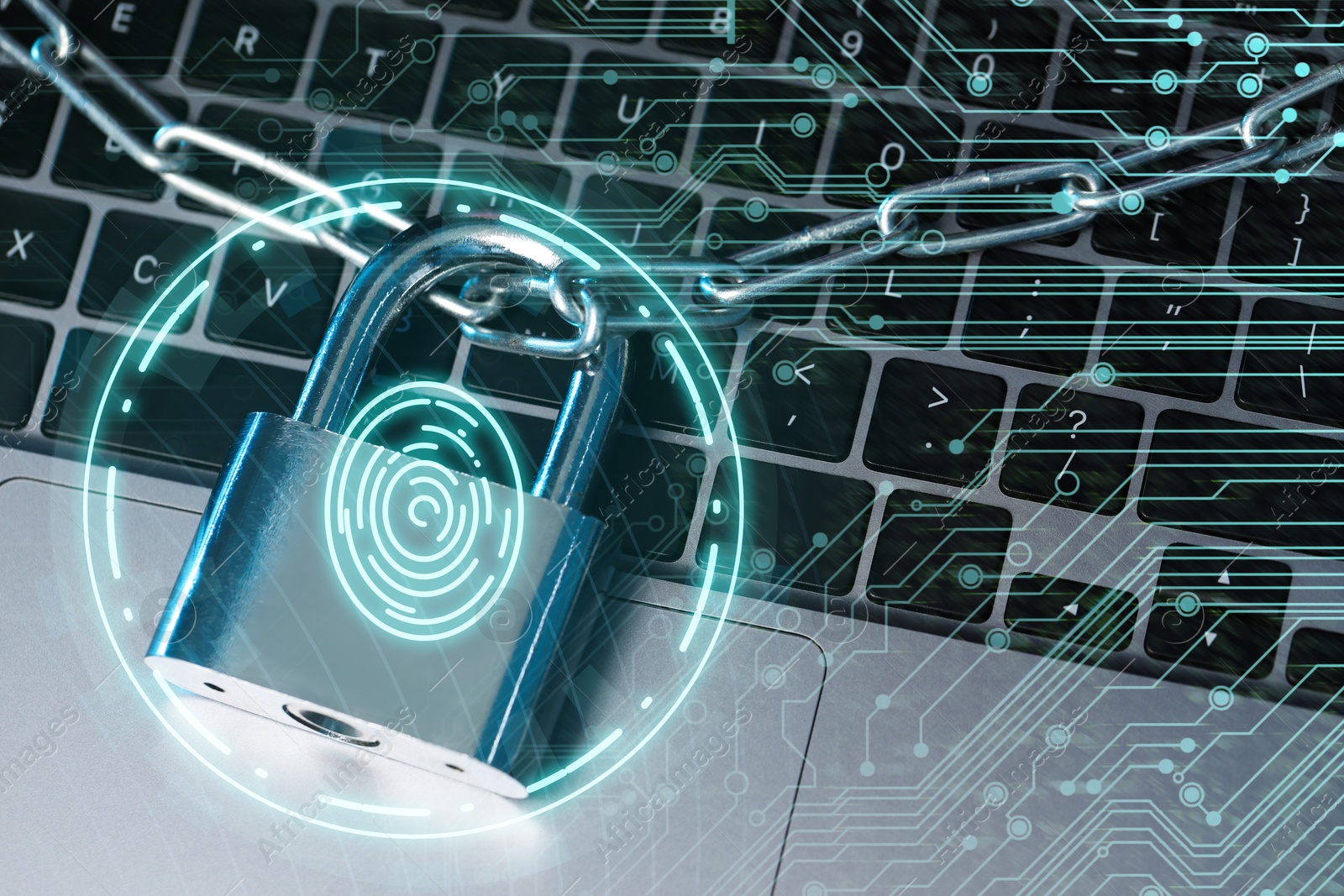 Padlock with digital fingerprint scan and chain on laptop. Circuit board pattern. Cyber security Image of Padlock with digital fingerprint scan and chain on laptop. Circuit board pattern. Cyber security